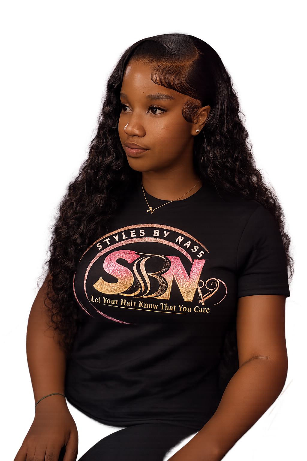 Client wearing a Styles by Nass professional T-shirt with long wavy hair